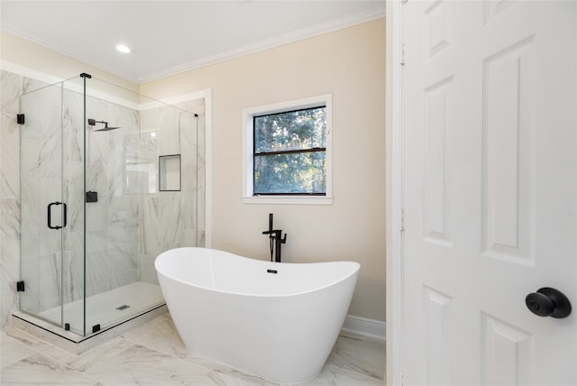 bathroom featuring ornamental molding and shower with separate bathtub