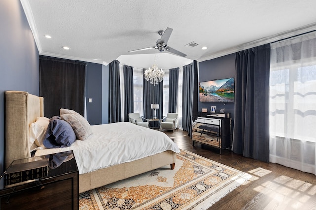 bedroom featuring multiple windows, crown molding, and hardwood / wood-style floors