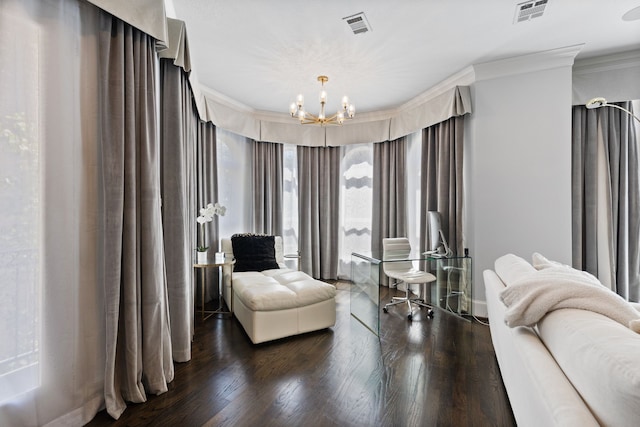 bedroom with an inviting chandelier, ornamental molding, and dark hardwood / wood-style flooring