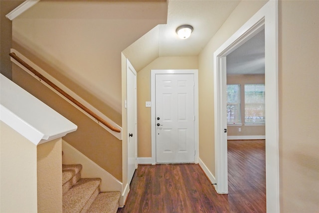 entryway with dark hardwood / wood-style floors