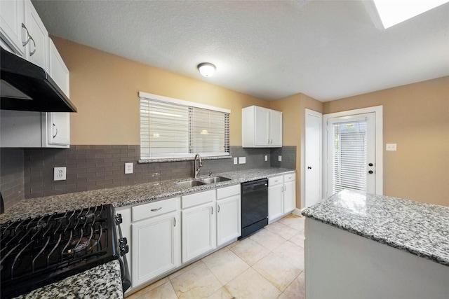 kitchen featuring light stone countertops, sink, white cabinets, and black appliances