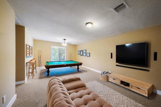 playroom with carpet flooring, pool table, and a textured ceiling