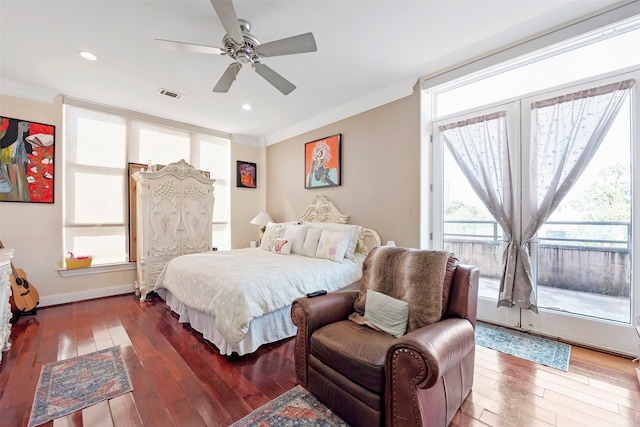 bedroom with ceiling fan, dark hardwood / wood-style floors, and ornamental molding