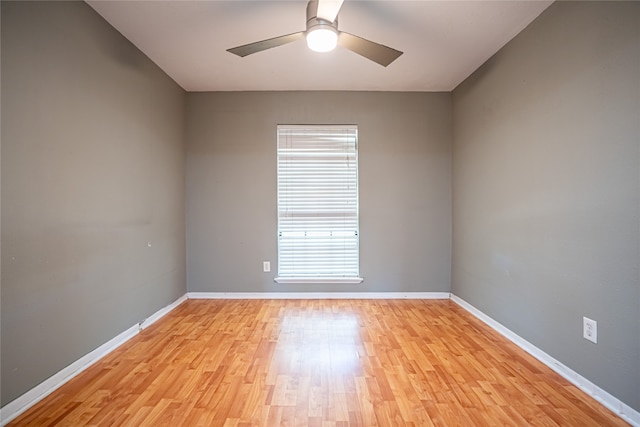 empty room featuring light hardwood / wood-style flooring and ceiling fan