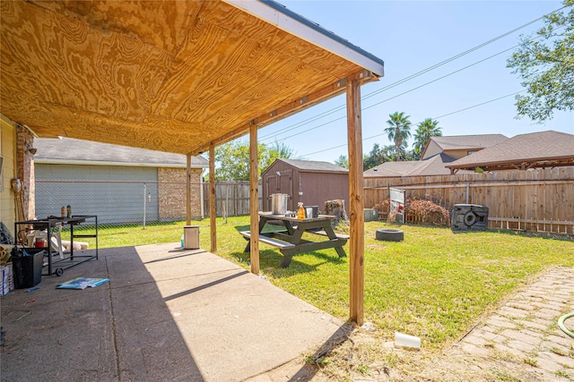 view of patio with a shed