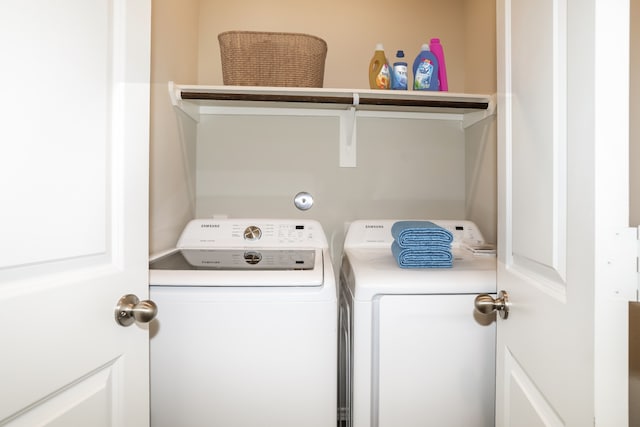 laundry room featuring washing machine and dryer