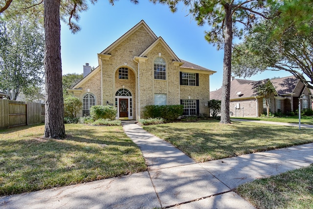 view of front of house with a front lawn