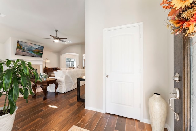 3307 Woodchuck Rd, Montgomery, TX 77356 - foyer featuring a ceiling fan, dark wood finished floors, baseboards, arched walkways, and lofted ceiling