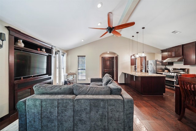 living room with ceiling fan, vaulted ceiling, and dark hardwood / wood-style flooring