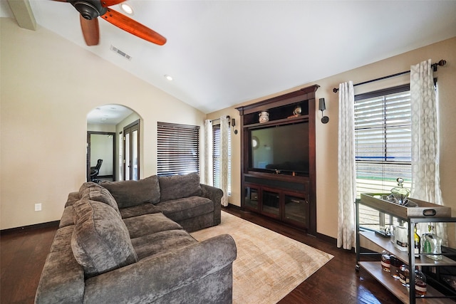 living room featuring vaulted ceiling, dark hardwood / wood-style flooring, and ceiling fan