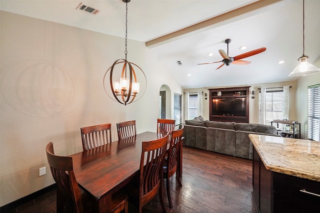 dining area with ceiling fan with notable chandelier, lofted ceiling with beams, and dark hardwood / wood-style flooring