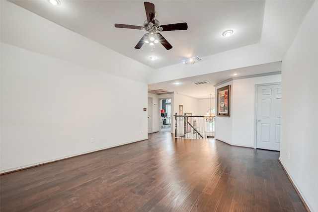 unfurnished room featuring dark wood-type flooring and ceiling fan