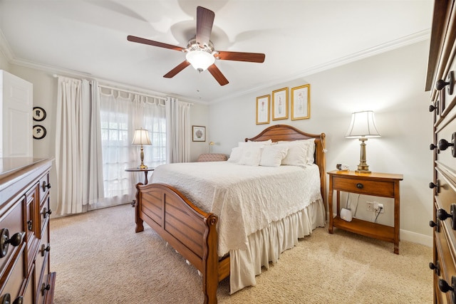 bedroom featuring ornamental molding, ceiling fan, and light carpet