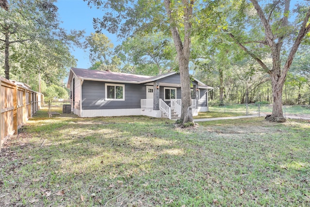 single story home with a front yard