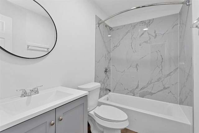 full bathroom featuring vanity, toilet, and tiled shower / bath