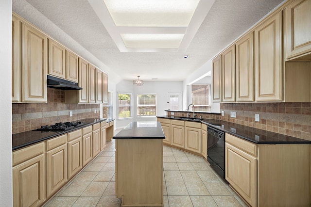 kitchen with light tile patterned flooring, sink, black appliances, a center island, and a textured ceiling