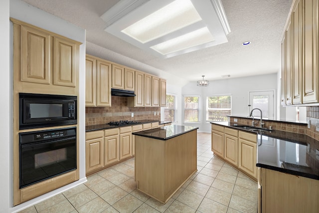 kitchen with black appliances, a center island, light tile patterned floors, and backsplash