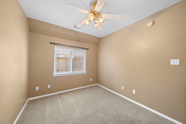 empty room featuring carpet and ceiling fan