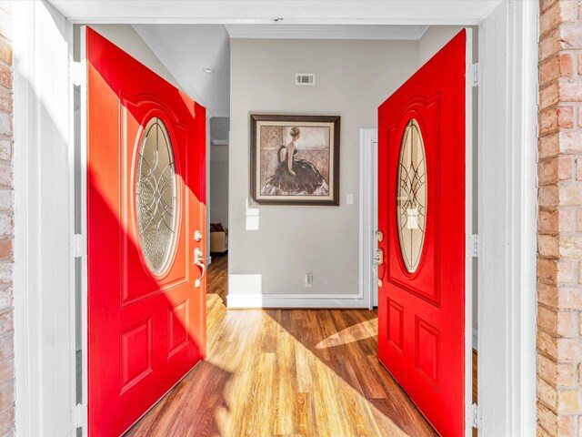 entrance foyer with hardwood / wood-style floors