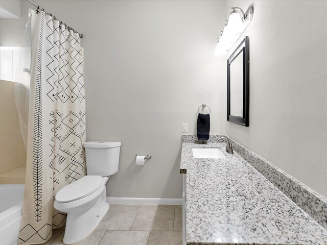 full bathroom with shower / bathtub combination with curtain, tile patterned flooring, vanity, and toilet