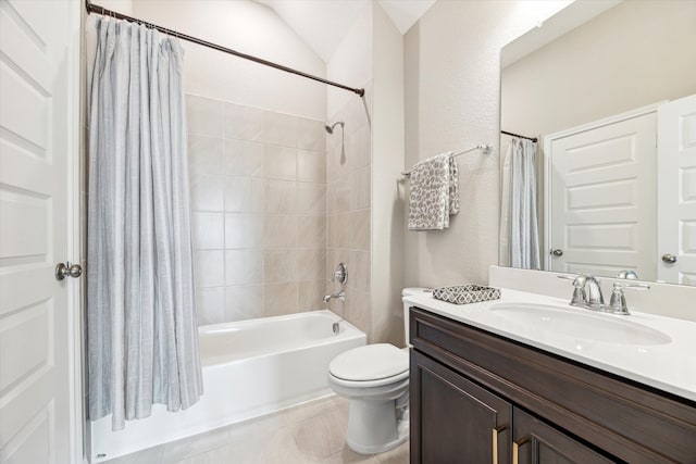 full bathroom featuring tile patterned floors, shower / bath combo, vanity, and toilet