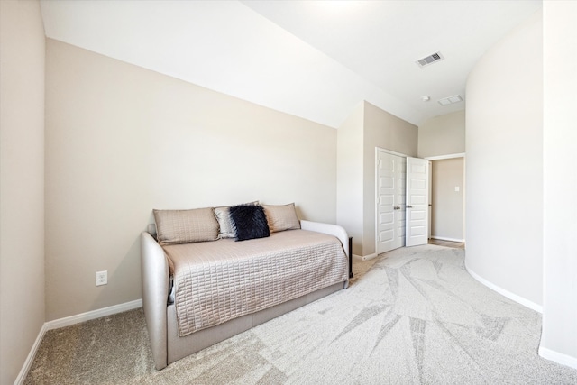 bedroom with light carpet