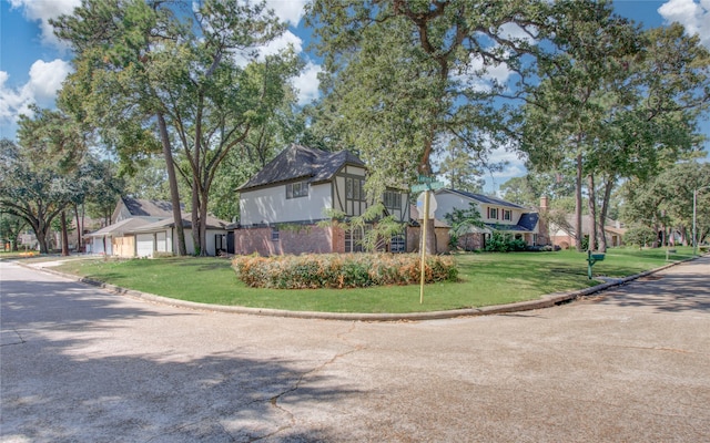 view of home's exterior with a lawn