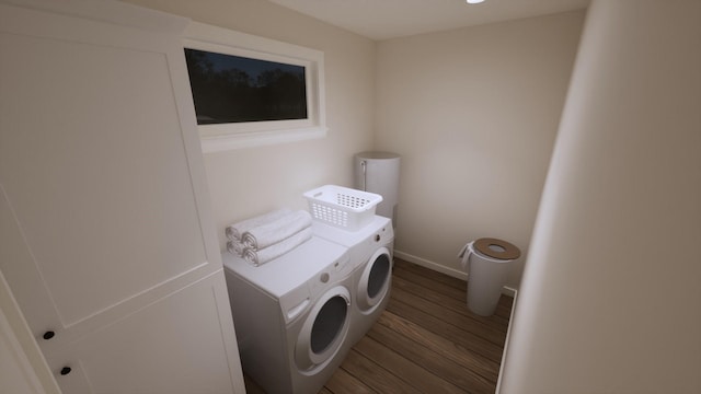 clothes washing area featuring separate washer and dryer and hardwood / wood-style flooring