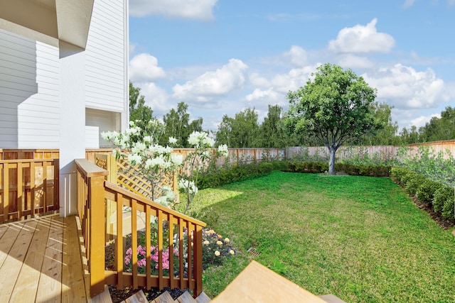 view of yard with a wooden deck