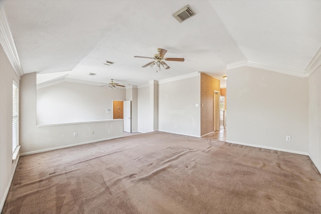 unfurnished living room featuring light colored carpet, crown molding, and vaulted ceiling