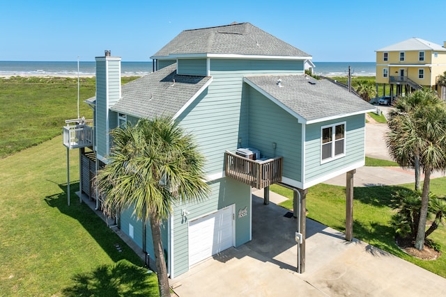 view of home's exterior featuring a water view, a garage, central air condition unit, and a yard