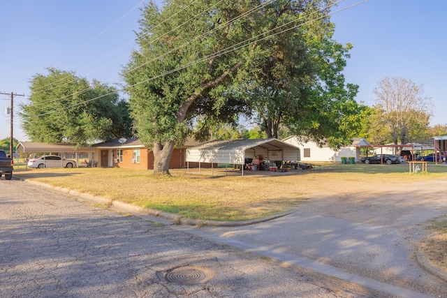 single story home with a carport