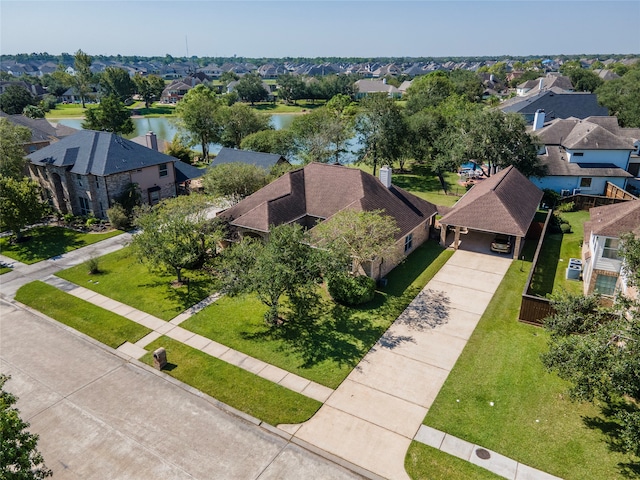 bird's eye view with a water view