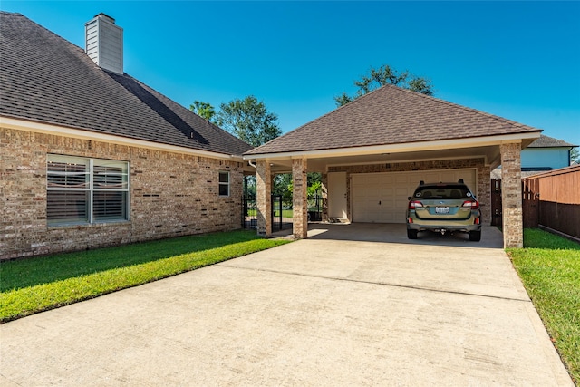 view of front of home with a garage and a front yard