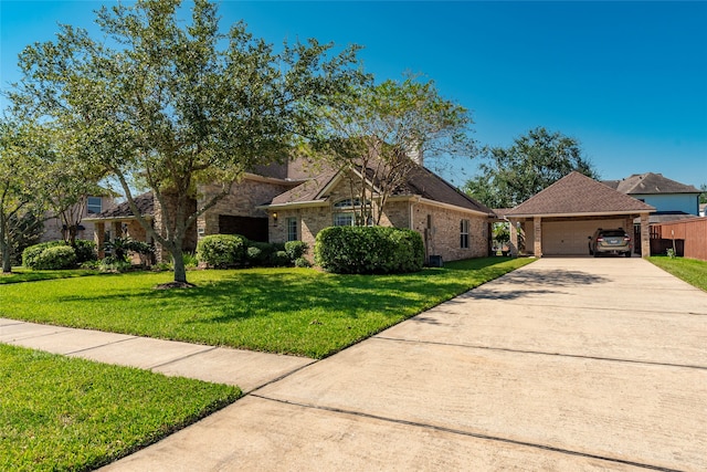 view of front of house with a front lawn and a garage