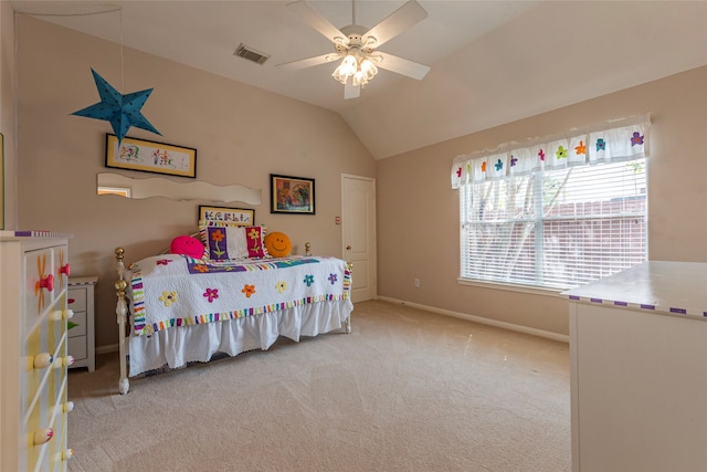 carpeted bedroom featuring vaulted ceiling and ceiling fan