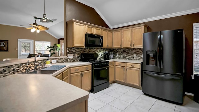 kitchen with black appliances, sink, kitchen peninsula, light tile patterned floors, and backsplash