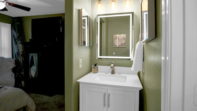 bathroom featuring vanity and ceiling fan