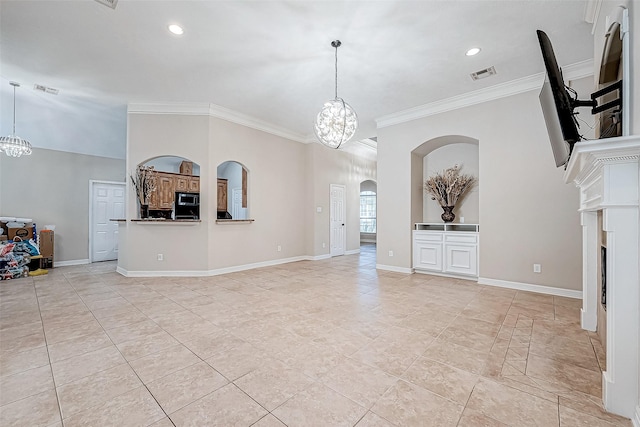 unfurnished living room with a chandelier, light tile patterned floors, and crown molding