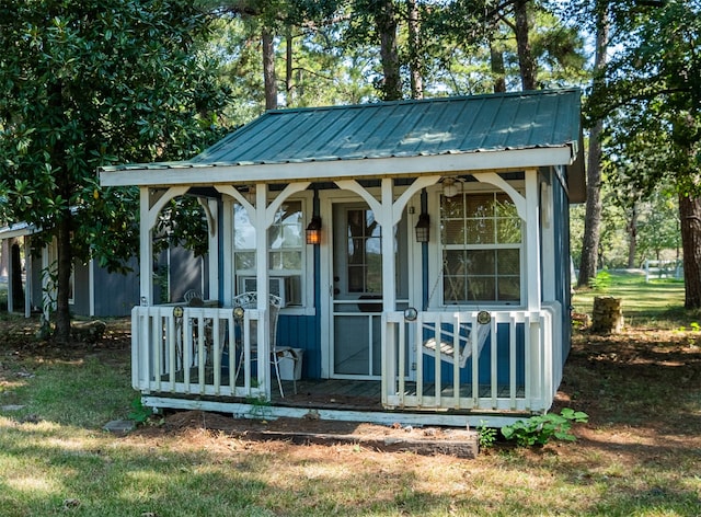 view of outbuilding featuring cooling unit