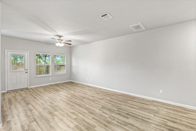 unfurnished room featuring ceiling fan and light hardwood / wood-style flooring