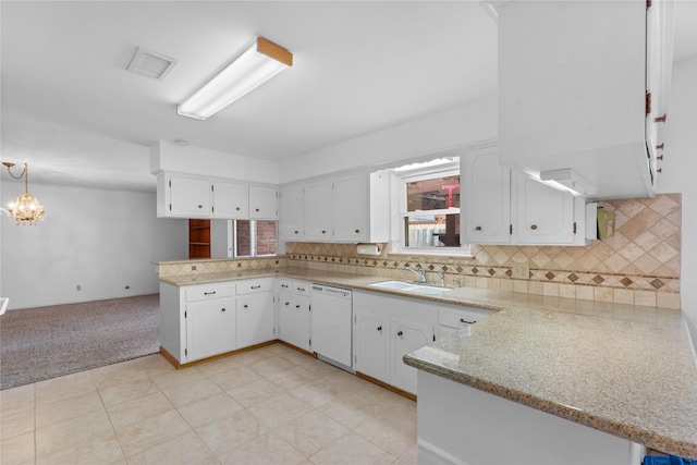 4415 Fallbrook Dr, Houston, TX 77018 - kitchen with dishwasher, a peninsula, a sink, and white cabinets