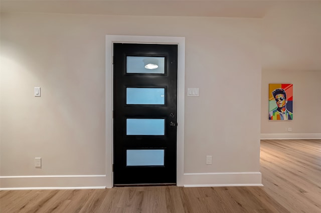 foyer entrance featuring light hardwood / wood-style floors