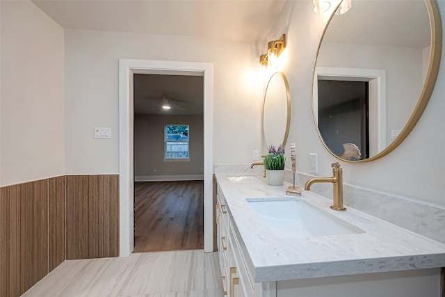 bathroom with vanity and hardwood / wood-style flooring