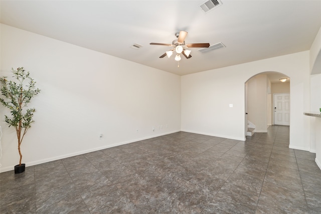 spare room featuring ceiling fan