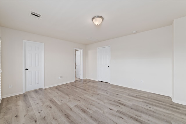 empty room featuring light wood-type flooring