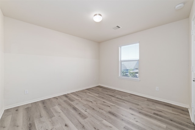 empty room featuring light hardwood / wood-style floors