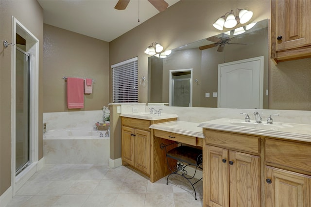 bathroom featuring tile patterned flooring, shower with separate bathtub, vanity, and ceiling fan