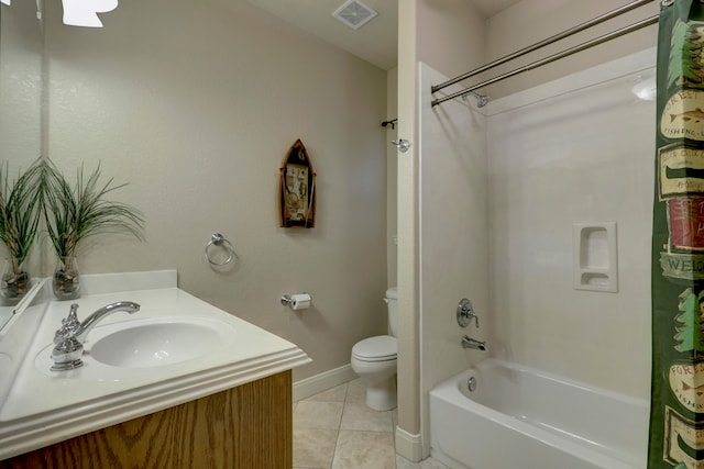 full bathroom featuring vanity, tile patterned flooring, toilet, and shower / bath combo