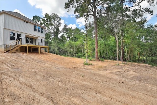 view of yard with a deck